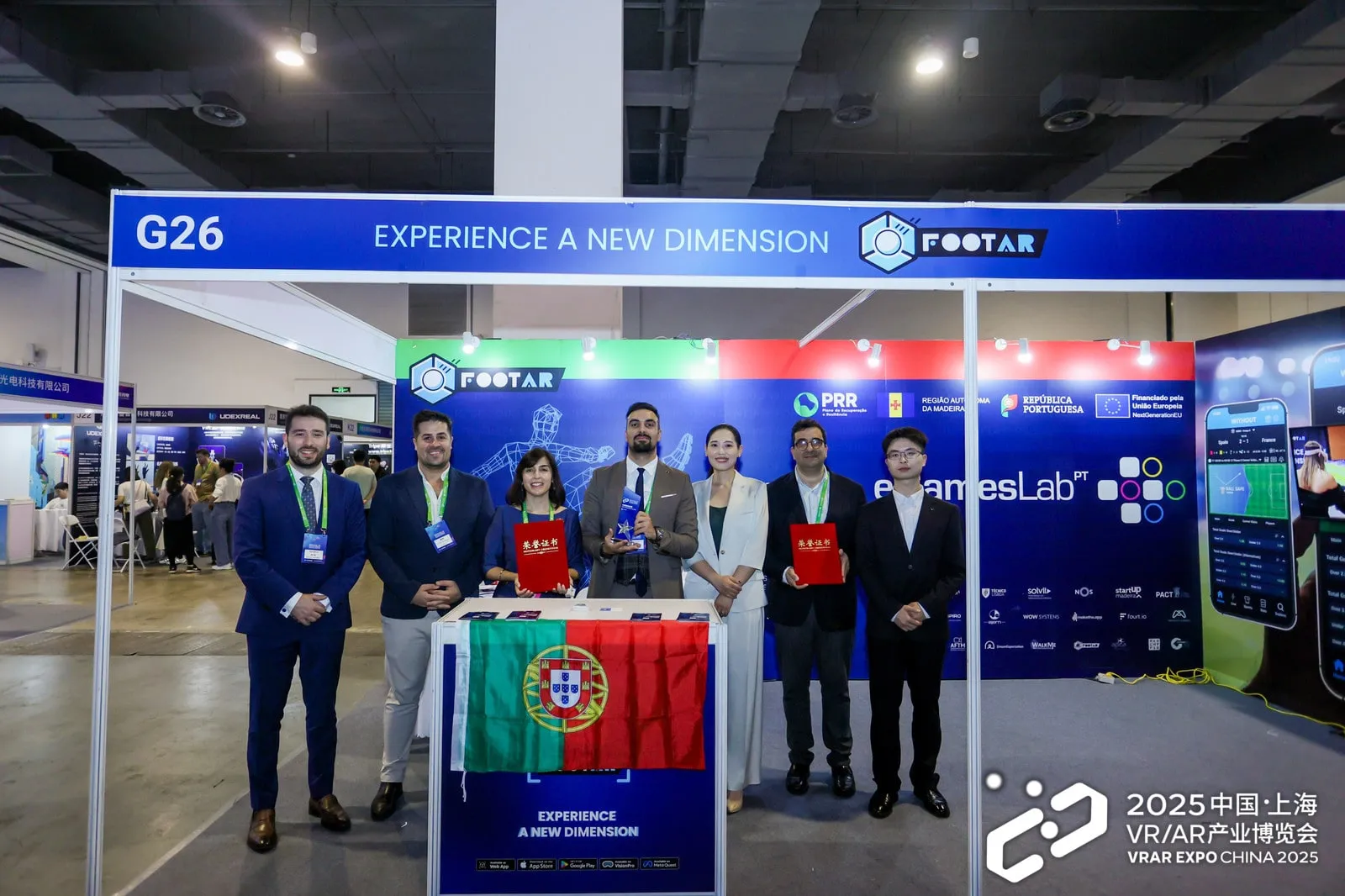 The eGames Lab delegation at its stand at VRAR Expo China 2025, with the FootAR banner